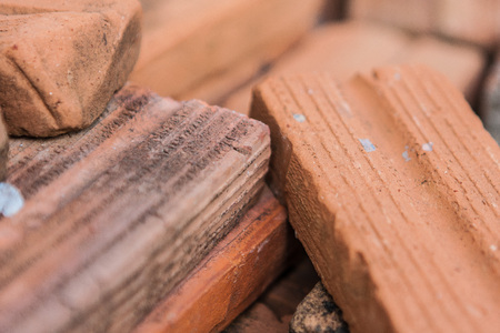 Old brick pile close up backgroundの写真素材