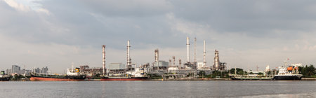 Bangkok Thailand , November 9 , 2017 : Petroleum plant ,Tanker in river with sky background and cloudsのeditorial素材