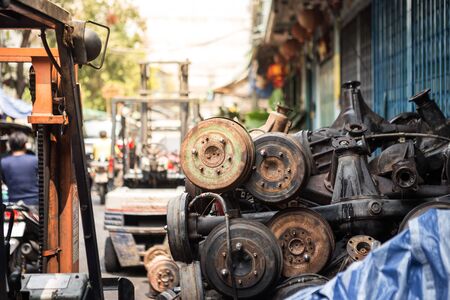 Many old car shaft are dirty and rusty at the junk yardの写真素材