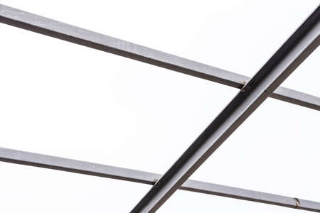 Steel roof frame on white backgroundの写真素材