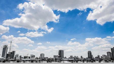Many buildings in Bangkok Thailand on blue sky background and cloudsの写真素材