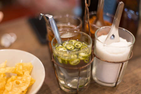 Selective focus of Seasoning of thai noodles on the tableの写真素材