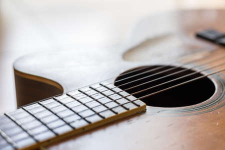 Selective focus of Scratches on the old acoustic guitarの写真素材