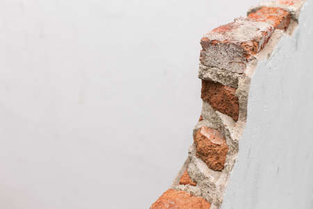 Masonry wall is broken texture backgroundの写真素材