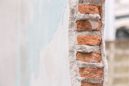 Masonry wall is broken texture backgroundの写真素材