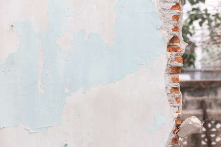 Masonry wall is broken texture backgroundの写真素材