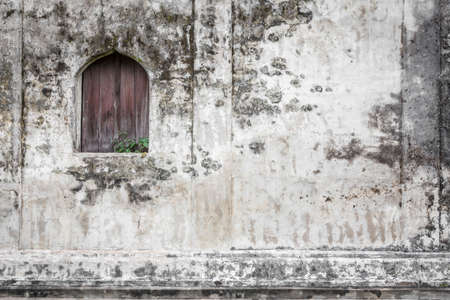 Old wooden window on historic buildings texture backgroundの写真素材