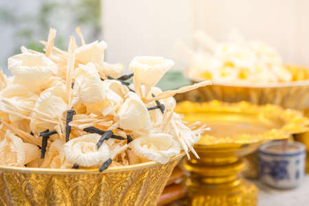 Sandalwood flower in gold tray used in Thai traditional funeralの写真素材