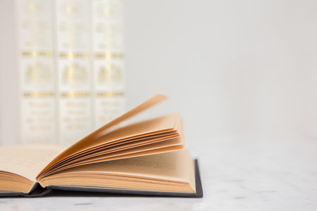 Close up of Old books opened on the reading table
