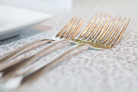 Close up of Silverware set on Luxury Dining Tableの写真素材