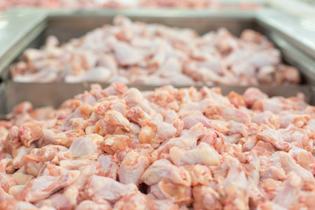 Selective focus of Many fresh chicken calves in the supermarket