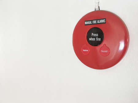 Fire Alarm Signal on white wall and copy spaceの写真素材