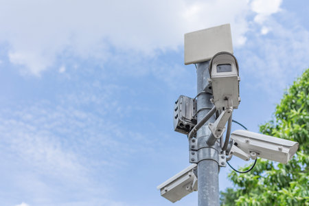 CCTV on the blue sky background With buildings in the city