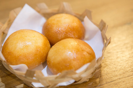 Fried steamed stuff bun in the basket in Chinese restaurant