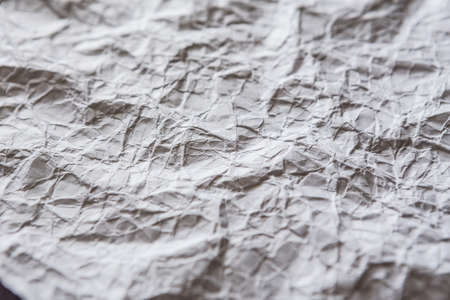 Selective focus of Pattern wrinkled paper close up texture backgroundの写真素材