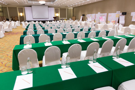 Bangkok Thailand , September 15 , 2019 : Paper, pencil, water bottle, glass on the table in the seminar room backgroundのeditorial素材