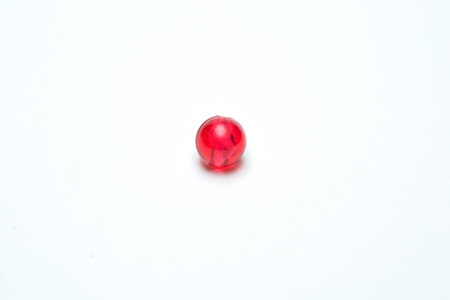 Red beads on a white background
