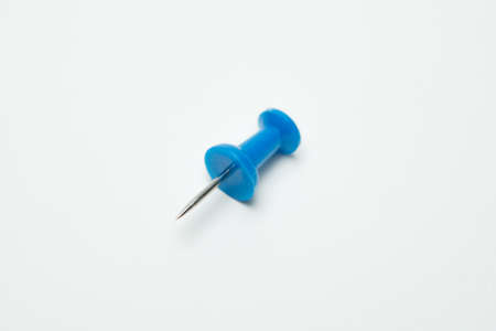 Close up of Blue pin on white backgroundの写真素材