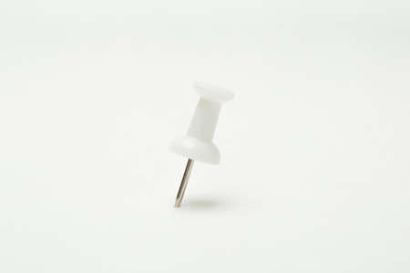 Close up of White pin on white backgroundの写真素材