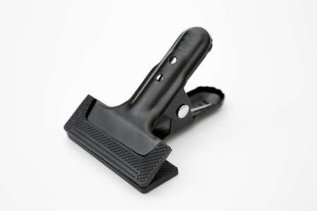 Black clamp used in industry on a white backgrouの写真素材