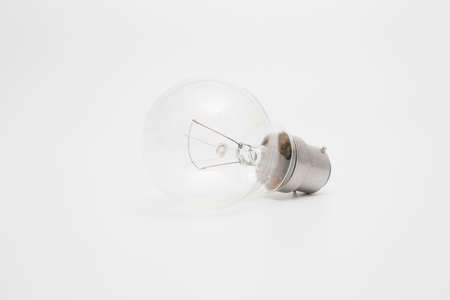 Tungsten light bulb on a white backgroundの写真素材