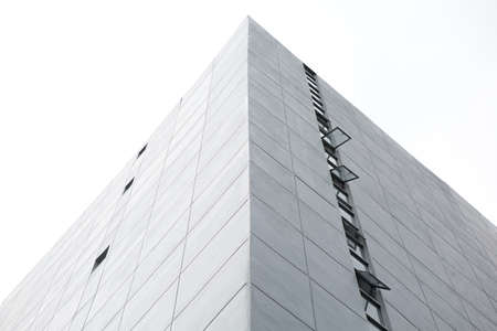 Perspective of Buildings on the white sky background and copy spaceの写真素材