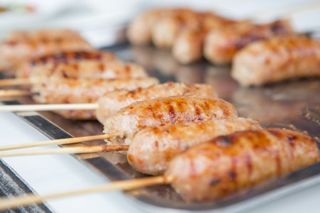Selective focus of Isan Sausage in a Tray Most popular food in Thailandの写真素材