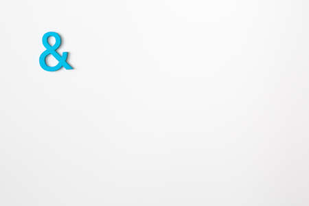 Blue wooden symbol "and" on white background and copy space for social media educational conceptの写真素材
