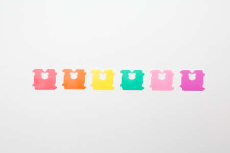 Colorful Plastic for sealing bread bags on white backgroundの写真素材
