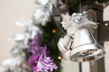 Blurred of christmas bell on a Christmas tree decorated in Christmas and New Year's Dayの写真素材