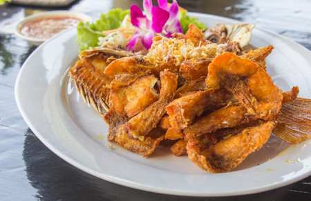 Fried fish on White dish