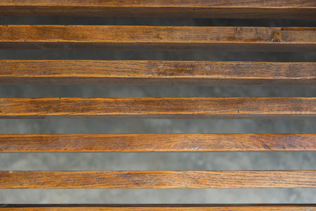brown wooden trellis in coffee shop over concrete floor background