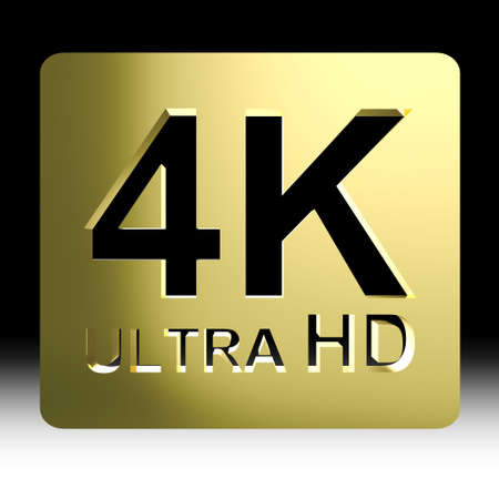 Gold 4K ultra HD sign isolated on black background の写真素材