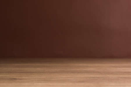 empty wooden table with brown background for montage objectの写真素材