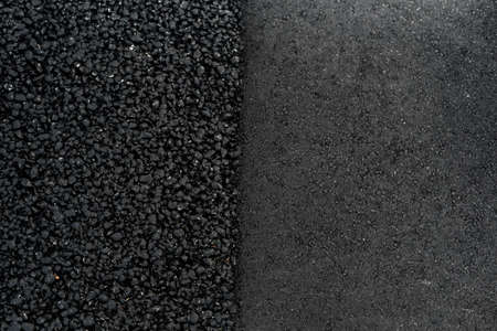 black road asphalt texture different rough and smooth surfaceの写真素材