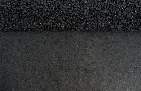 black road asphalt texture different rough and smooth surface
