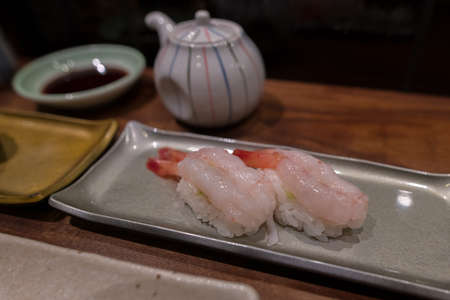 japanese  food  sushi set  uni sushi  and white fish with salt and yuzu , king crab hokkaido miso soup ,grilled fish  very fresh and deliciousの写真素材