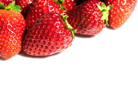 fresh and delicious red strawberry fruits with green leaf  on backgroundの写真素材