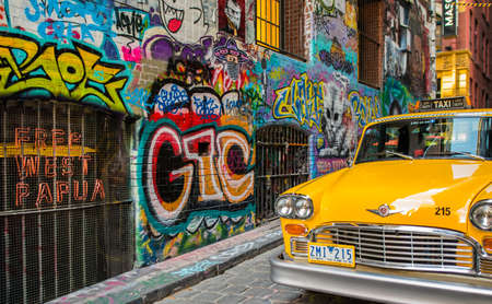 Melbourne, AUSTRALIA - November 14 , 2017 : yellow taxi parking at Hosier lane the  famous graffiti art streetのeditorial素材