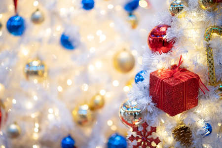 Christmas background  decoration with lighting and gift box ,Focus on foregroundの写真素材