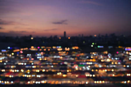 abstract blurred bokeh background from city downtown lighting with defocused and double explosure technichの写真素材