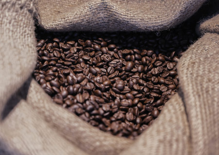 roast fresh coffee bean in cloth sack,ready for make a good coffee  in the morning