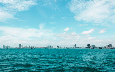 The big city near the beach shoot from seaの写真素材