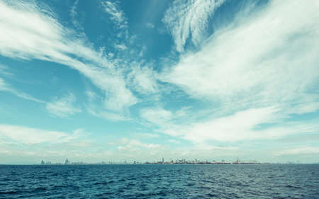 The big city near the beach shoot from seaの写真素材