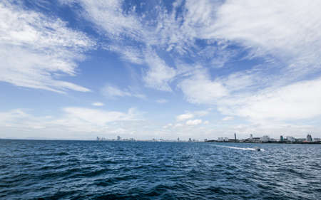 The big city near the beach shoot from seaの写真素材