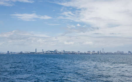 The big city near the beach shoot from seaの写真素材