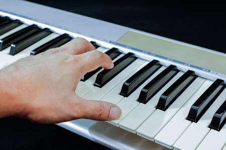 The midi keyboard controller on black backgroundの写真素材
