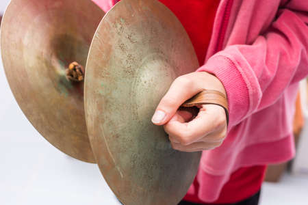 The children is playing cymbalの写真素材