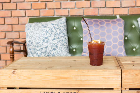 iced tea and lemon put on wood boxの写真素材