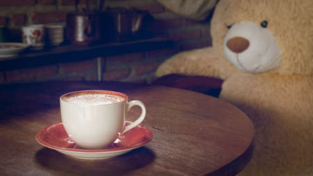 Coffee cup in coffee shop process vintage style picture, selective focusの写真素材